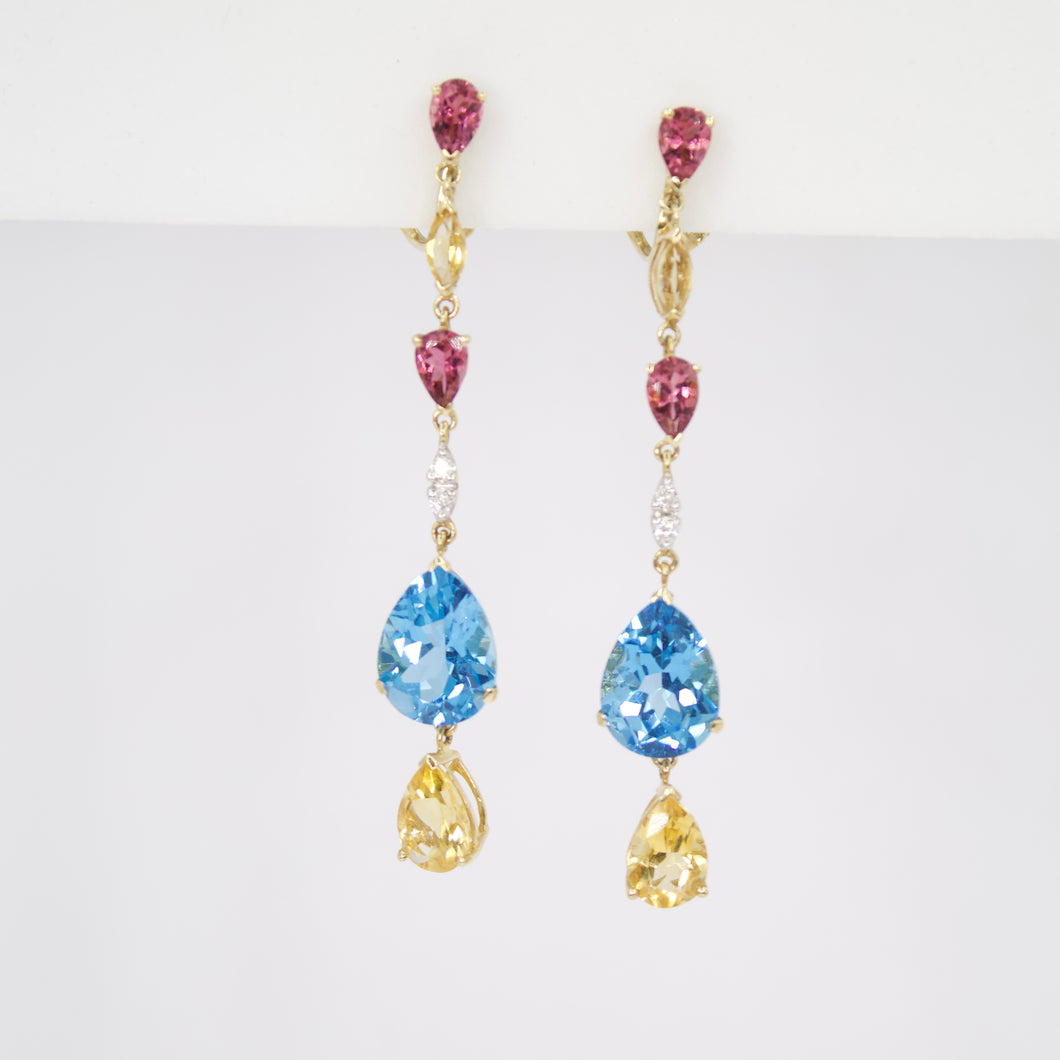 Aretes en oro amarillo 14k con piedras naturales.