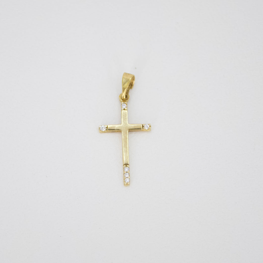 Cruz en oro amarillo 14k con zirconia