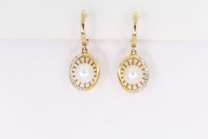Aretes en oro amarillo 14k con Perla y diamantes.