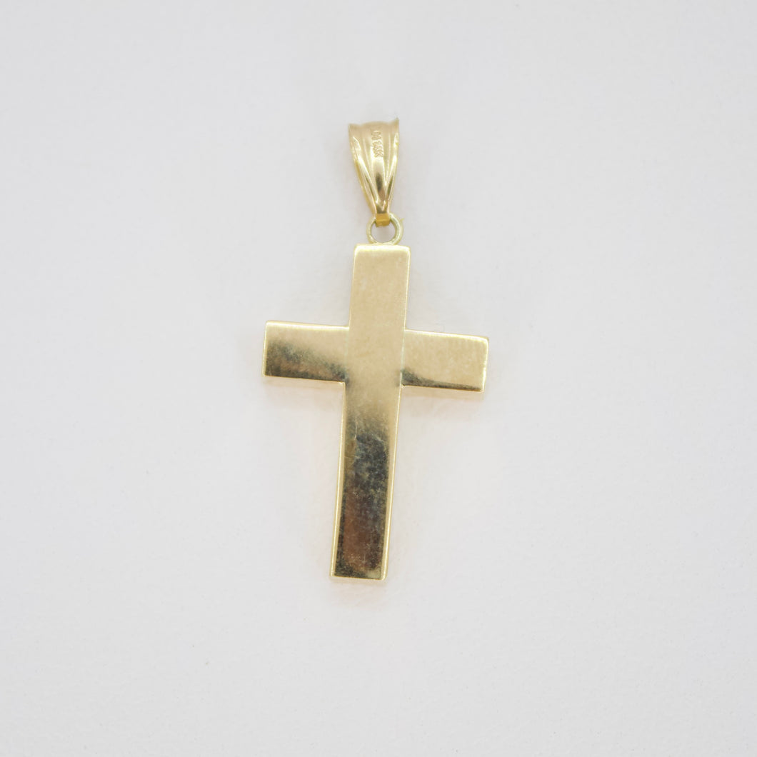 Cruz en oro amarillo 14k.