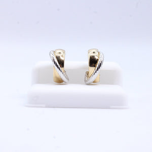 Aretes huggies en oro combinado 14k