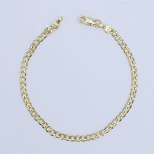 Pulso cubano en oro amarillo 14k.
