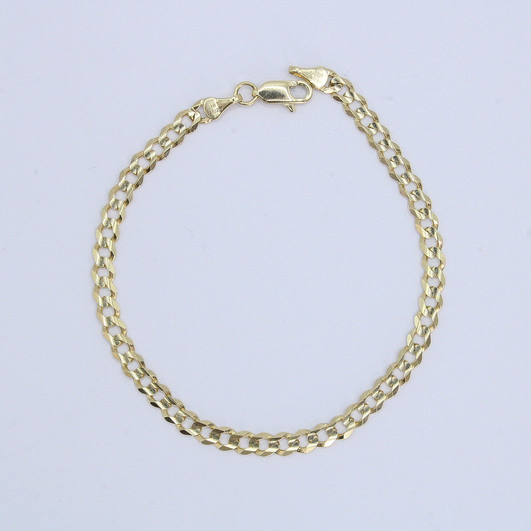Pulso cubano en oro amarillo 14k.