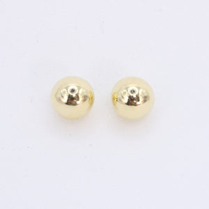 Broquel dormilona en oro amarillo 14k.