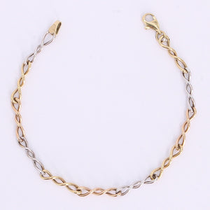 Pulsera torsal en oro florentino 14k.